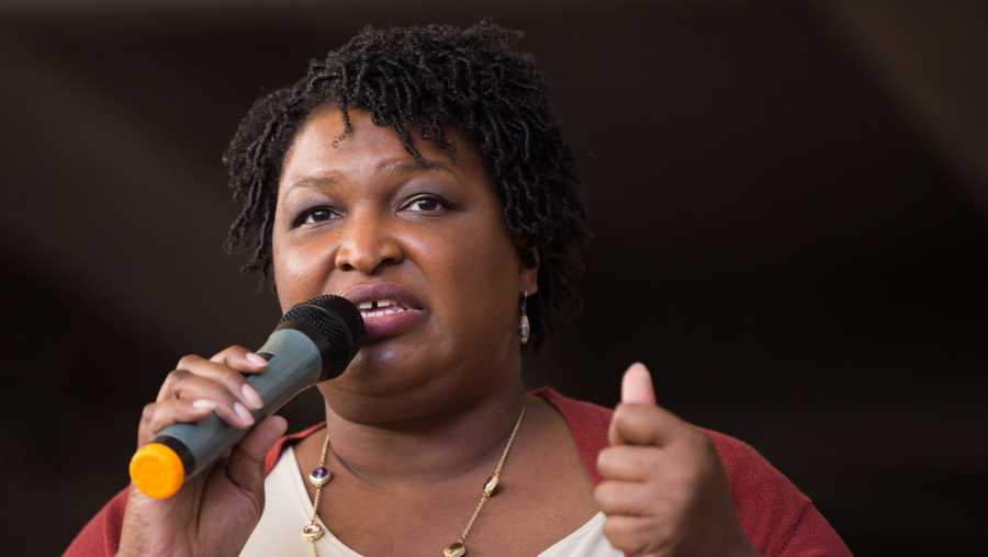 Stacey Abrams talks to a crowd gathered for the 'Souls to The Polls' march in downtown Atlanta on Oct. 28, 2018 in Atlanta, Georgia.