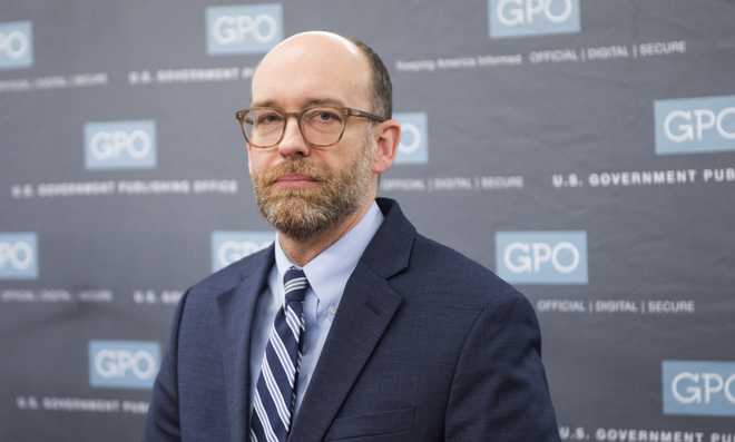 UNITED STATES - MARCH 7: Acting OMB Director Russ Vought parfticipates in a photo-op for the printing of President Donald Trumps budget for Fiscal Year 2020 at the Government Publishing Office in Washington on Thursday, March 7, 2019. (Photo By Bill Clark/CQ Roll Call)