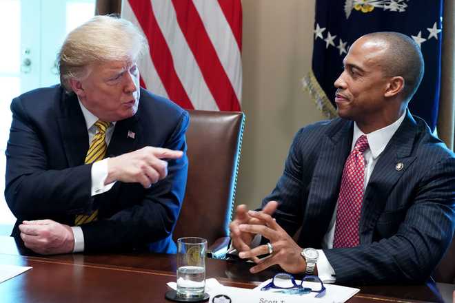 WASHINGTON, DC - APRIL 04: U.S. President Donald Trump introduces White House Opportunity and Revitalization Council Executive Director Scott Turner during the inaugural meeting of the council in the Cabinet Room at the White House April 04, 2019 in Washington, DC. (Photo by Chip Somodevilla/Getty Images)