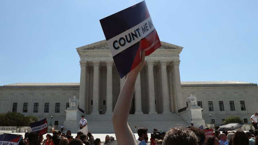 WASHINGTON, DC - JUNE 27: People gather in front of the U.S. Supreme Court after several decisions were handed down on June 27, 2019 in Washington, DC. The high court blocked a citizenship question from being added to the 2020 census for now, and in another decision ruled that the Constitution does not bar partisan gerrymandering.