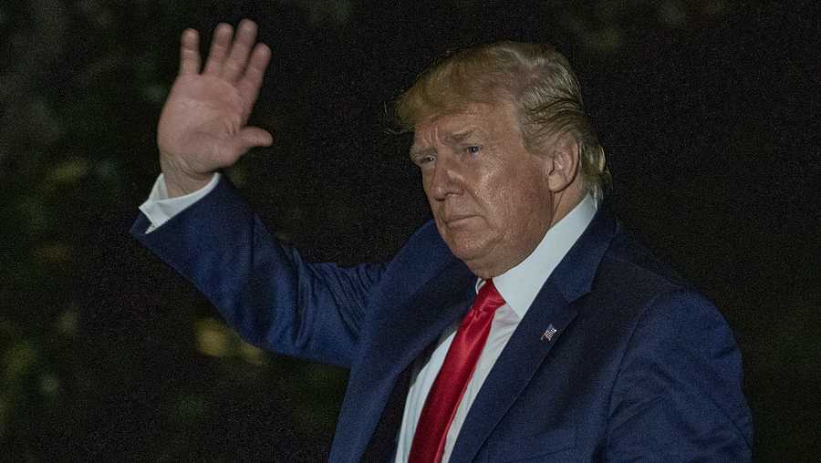 U.S. President Donald Trump waves after he walks off Marine One on July 17, 2019 in Washington, DC.