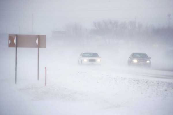 RUDD, IOWA - NOVEMBER 27: Snow blows across a road on November 27, 2019 near Rudd, Iowa. A winter storm, which dumped rain, ice, snow and brought high winds into much of the upper Midwest, has been hampering holiday travel by road and by air on one of the busiest travel days of the year. (Photo by Scott Olson/Getty Images)