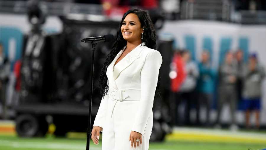Demi Lovato performs the national anthem onstage during Super Bowl LIV at Hard Rock Stadium on Feb. 2, 2020.