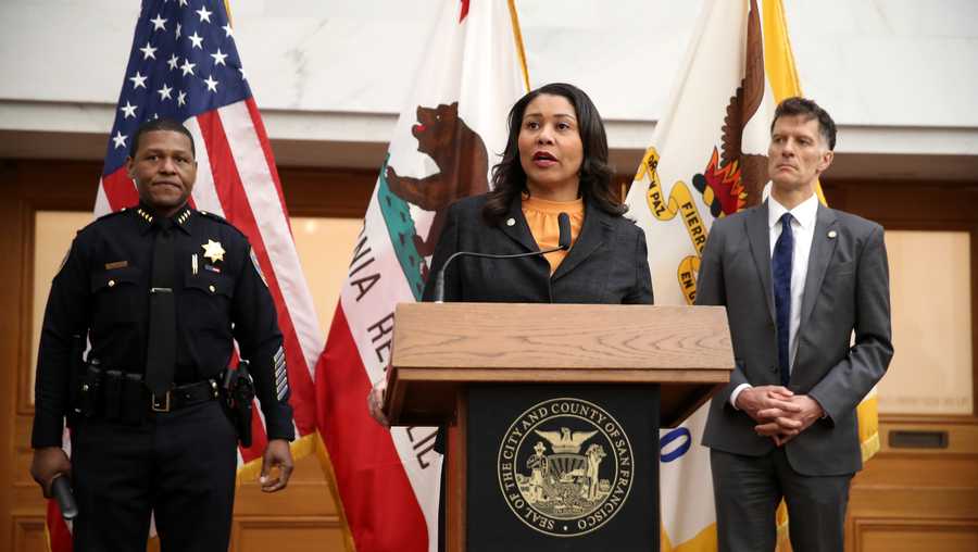 SAN FRANCISCO, CALIFORNIA - MARCH 16: San Francisco Mayor London Breed (C) speaks during a press conference as San Francisco police chief William Scott (L) and San Francisco Department of Public Health director Dr. Grant Colfax (R) look on at San Francisco City Hall on March 16, 2020 in San Francisco, California. San Francisco Mayor London Breed announced a shelter in place order for residents in San Francisco until April 7. The order will allow people to leave their homes to do essential tasks such as grocery shopping and pet walking. (Photo by Justin Sullivan/Getty Images)