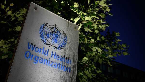 TOPSHOT - A photo taken in the late hours of May 29, 2020 shows a sign of the World Health Organization (WHO) at their headquarters in Geneva amid the COVID-19 outbreak, caused by the novel coronavirus. - President Donald Trump said May 29, 2020, he was breaking off US ties with the World Health Organization, which he says failed to do enough to combat the initial spread of the novel coronavirus. (Photo by Fabrice COFFRINI / AFP) (Photo by FABRICE COFFRINI/AFP via Getty Images)