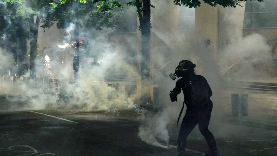 Federal officers use gas to clear protesters in Portland, Oregon