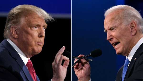 TOPSHOT - (COMBO) This combination of pictures created on October 22, 2020 shows US President Donald Trump (L) and Democratic Presidential candidate and former US Vice President Joe Biden during the final presidential debate at Belmont University in Nashville, Tennessee, on October 22, 2020. (Photo by Brendan Smialowski and JIM WATSON / AFP) (Photo by BRENDAN SMIALOWSKIJIM WATSON/AFP via Getty Images)