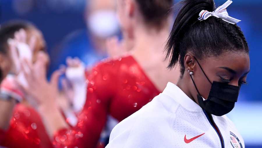 27 July 2021, Japan, Tokio: Gymnastics: Olympics, team, women, final at Ariake Gymnastics Centre: Simone Biles of the USA wears a mask after leaving the team final with an injury. Photo: Marijan Murat/dpa (Photo by Marijan Murat/picture alliance via Getty Images)