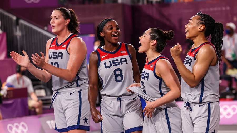 Tokyo, Japan, Wednesday July 28 2021 - A. Jubilant USA celebrate moments after winning Gold in the the 3X3 Women Basketball Final. Left to right are, Stefanie Dolson, Jaqueline Law, Kelsie Plum and Allisha Gray. (Robert Gauthier/Los Angeles Times via Getty Images)