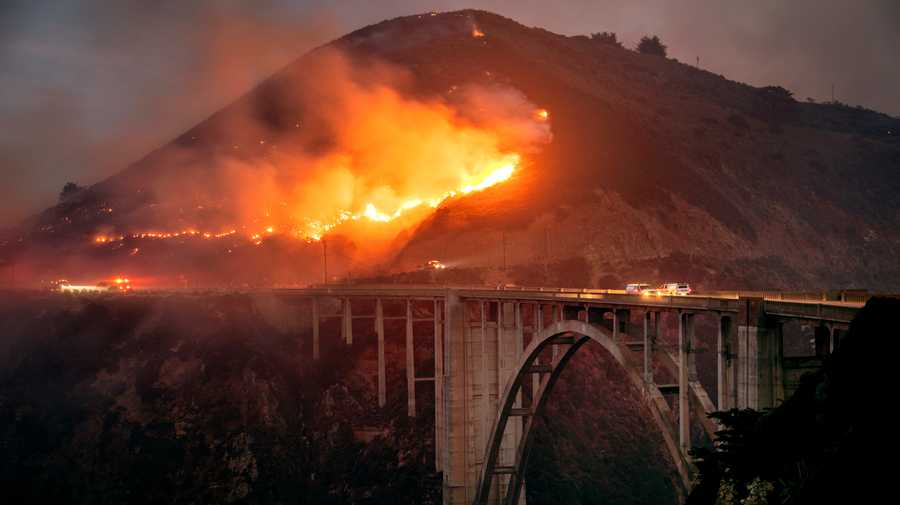 BIG SUR, CALIFORNIA - JANUARY 22: The Colorado Fiire burns down toward the Bixby Bridge in Big Sur, California, early Saturday morning, Jan. 22, 2022. (Photo by Karl Mondon/MediaNews Group/The Mercury News via Getty Images)