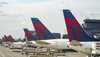 Delta airlines airplanes are seen parked at Hartsfield-