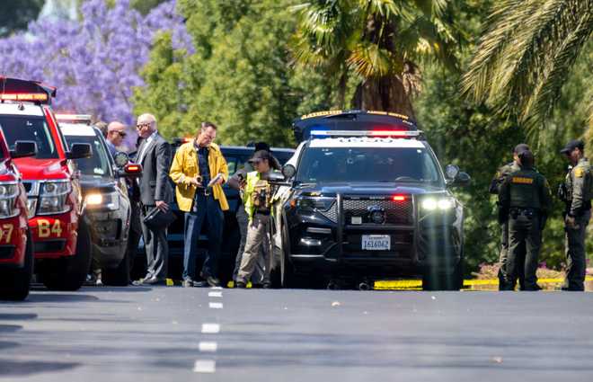 Laguna&#x20;Woods,&#x20;CA&#x20;-&#x20;May&#x20;15&#x3A;&#x20;Orange&#x20;Sheriff&#x20;deputies&#x20;and&#x20;investigators&#x20;gather&#x20;on&#x20;Calle&#x20;Sonora&#x20;after&#x20;one&#x20;person&#x20;died&#x20;and&#x20;four&#x20;people&#x20;were&#x20;critically&#x20;injured&#x20;in&#x20;a&#x20;shooting&#x20;at&#x20;a&#x20;Geneva&#x20;Presbyterian&#x20;Church&#x20;in&#x20;Laguna&#x20;Woods&#x20;on&#x20;Sunday,&#x20;May&#x20;15,&#x20;2022.