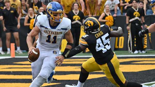 IOWA CITY, IA - SEPTEMBER 03: Iowa right defensive end Deontae Craig (45) runs down South Dakota State quarterback Mark Gronowski (11) as he tries to pass from the end zone during a college football game between the South Dakota State Jackrabbits and the Iowa Hawkeyes, September 03, 2022, at Kinnick Stadium, Iowa City, IA. Photo by Keith Gillett/Icon Sportswire via Getty Images),