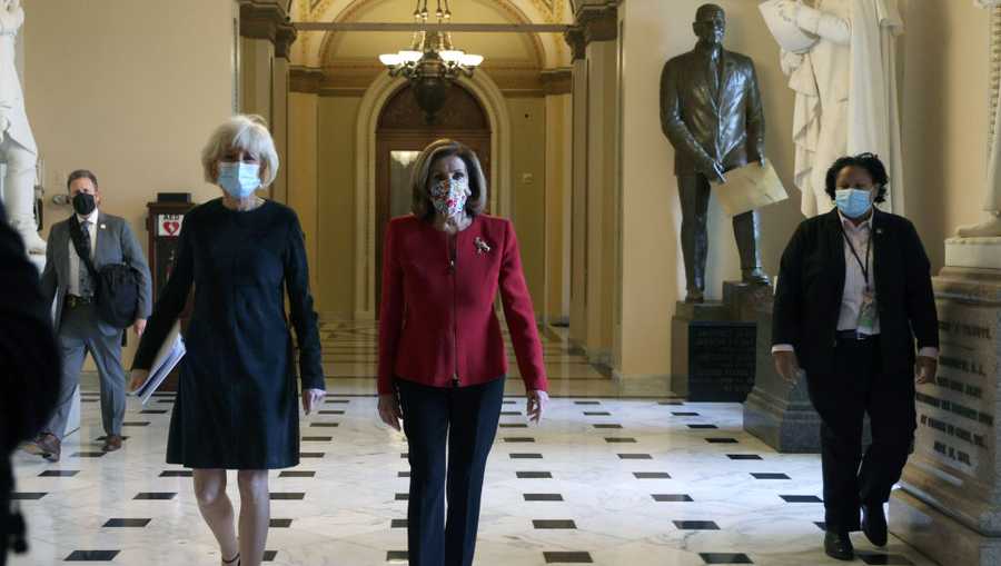 U.S. Speaker Rep. Nancy Pelosi (D-CA) walks with 60 Minutes correspondent Lesley Stahl of CBS News in a hallway at the U.S. Capitol Jan. 8, 2021 in Washington, D.C. (Photo by Alex Wong/Getty Images)