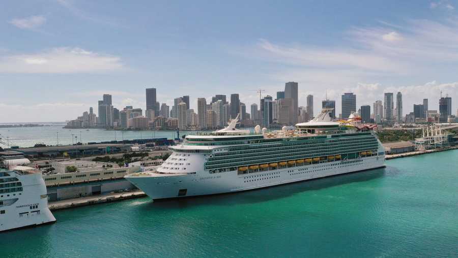 MIAMI, FLORIDA - MARCH 02: An aerial view from a drone shows Royal Caribbean’s Navigator of the Sea cruise ship docked at PortMiami on March 02, 2021 in Miami, Florida. Royal Caribbean Group announced plans to use the proceeds from a $1.5 billion sale of shares to pay off debt stemming from the pandemic. (Photo by Joe Raedle/Getty Images)