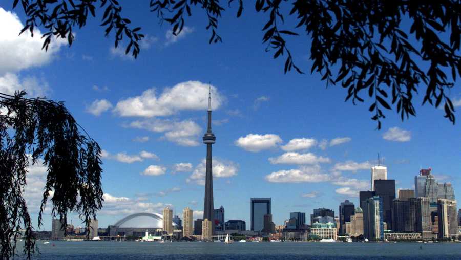 The CN Tower and the Skydome highlight the Toronto skyline in his undated file photo. (Photo by Carlo Allegri/Getty Images)