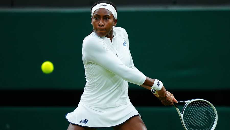 LONDON, ENGLAND - JULY 06: Coco Gauff of The United States, playing partner of Caty McNally of The United States plays a backhand in their Ladies&apos; Doubles Third Round match against Veronika Kudermetova and Elena Vesnina of Russia during Day Eight of The Championships - Wimbledon 2021 at All England Lawn Tennis and Croquet Club on July 06, 2021 in London, England. (Photo by Mike Hewitt/Getty Images)