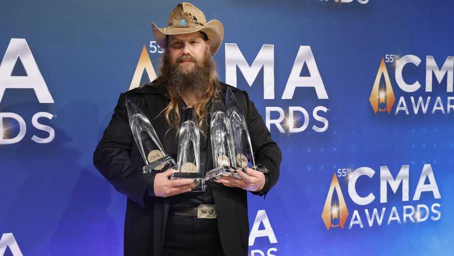 NASHVILLE, TENNESSEE - NOVEMBER 10: Chris Stapleton poses with his awards for the 55th annual Country Music Association awards at the Bridgestone Arena on November 10, 2021 in Nashville, Tennessee. (Photo by Jason Kempin/Getty Images)