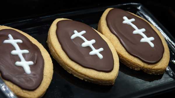 Super Bowl party cookies. Football shape cookies. Home made cookies concept. . High quality photo