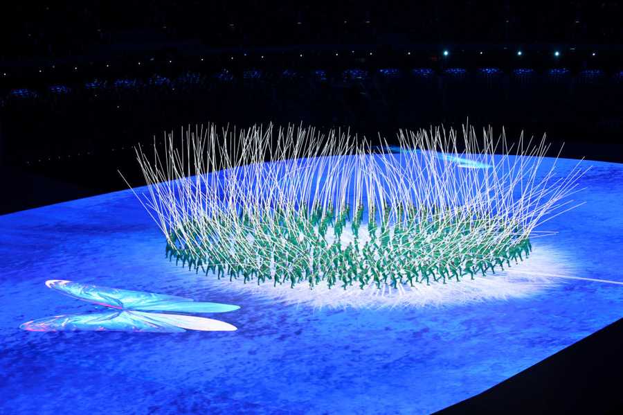 Spring celebrated BEIJING, CHINA - FEBRUARY 04: Performers create a flower display with LED lights during the Opening Ceremony of the Beijing 2022 Winter Olympics at the Beijing National Stadium on February 04, 2022 in Beijing, China. (Photo by Adam Pretty/Getty Images)