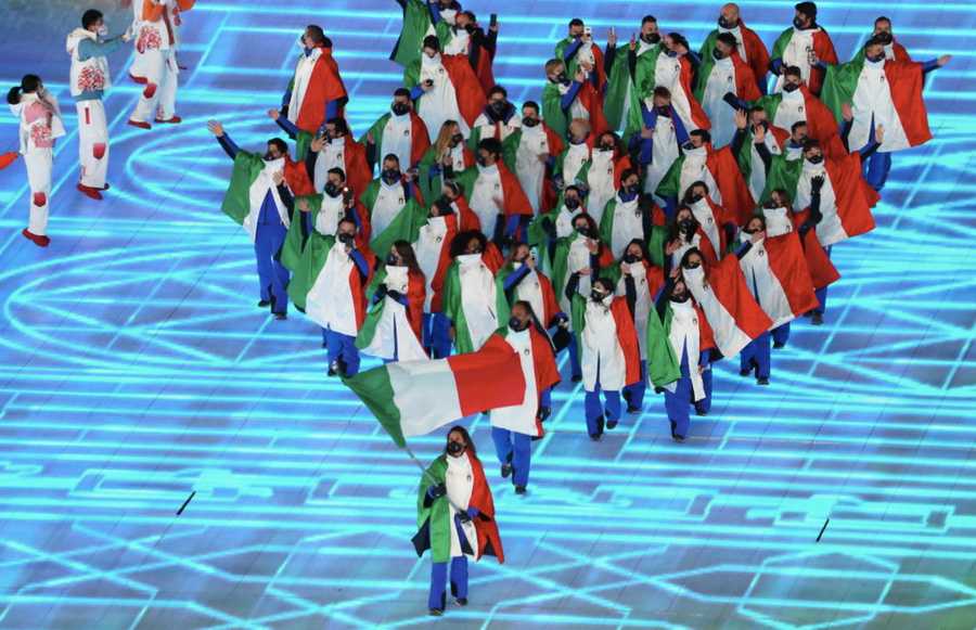 Opening Ceremony - Beijing 2022 Winter Olympics Day 0 BEIJING, CHINA - FEBRUARY 04: Flag bearer Michela Moioli of Team Italy leads their team out during the Opening Ceremony of the Beijing 2022 Winter Olympics at the Beijing National Stadium on February 04, 2022 in Beijing, China. (Photo by Xavier Laine/Getty Images)