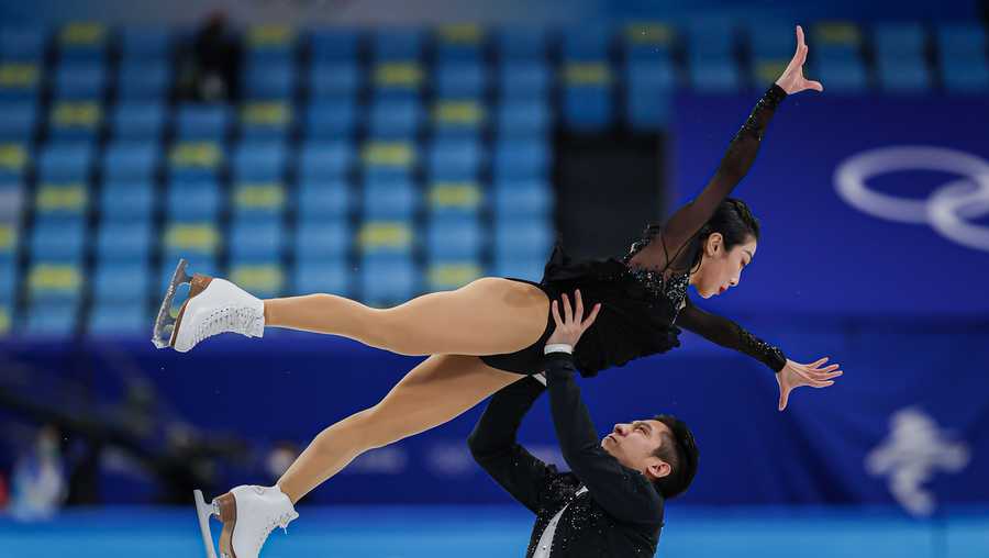 Winter Olympics Video China's Sui Wenjing, Han Cong set pairs record