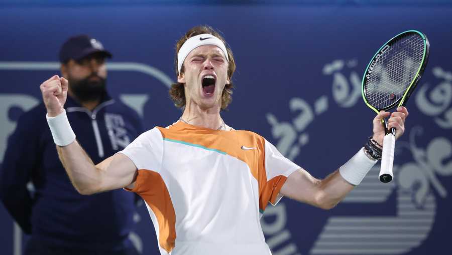 DUBAI, UNITED ARAB EMIRATES - FEBRUARY 25: Andrey Rublev of Russia celebrates after defeating Hubert Hurkacz of Poland in their semi-final match during day 12 of the Dubai Duty Free Tennis at Dubai Duty Free Tennis Stadium on February 25, 2022 in Dubai, United Arab Emirates. (Photo by David Gray/Getty Images)