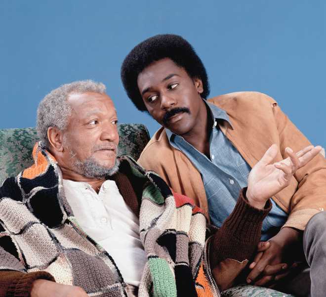 Redd Foxx as Fred G. Sanford, Demond Wilson as Lamont Sanford