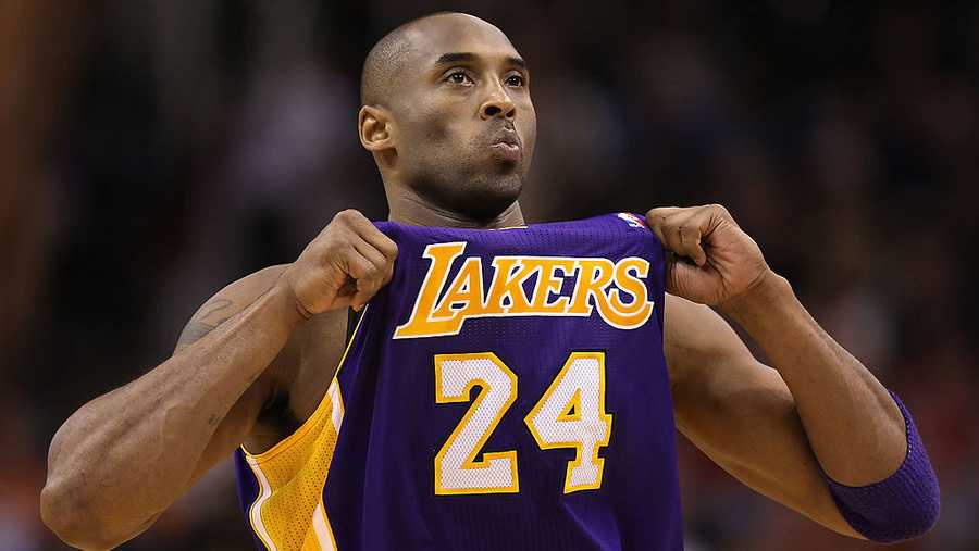 PHOENIX, AZ - FEBRUARY 19:  Kobe Bryant #24 of the Los Angeles Lakers adjusts his jersey during the NBA game against the Phoenix Suns at US Airways Center on February 19, 2012 in Phoenix, Arizona. The Suns defeated the Lakers 102-90. 
