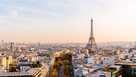 Paris skyline with Eiffel Tower at sunset, aerial view, France