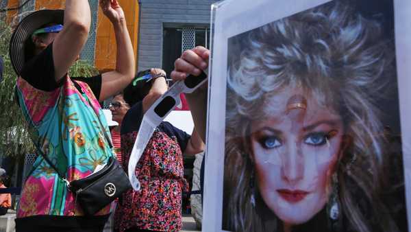 (082117 Boston, MA) A portrait of "Total Eclipse of the Heart" singer Bonnie Tyler is as people watch the eclipse at the Boston Children's Museum, Monday, August 21, 2017. Staff photo by Angela Rowlings (Photo by Angela Rowlings/MediaNews Group/Boston Herald via Getty Images)