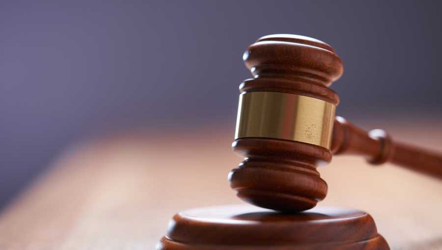 Stock photo of gavel in a courthouse.