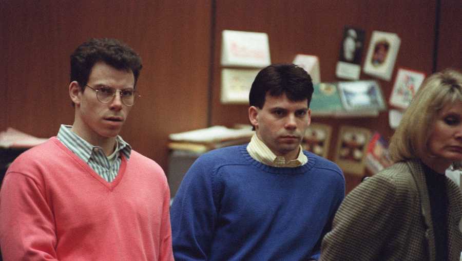 Erik Menendez (L) and his brother Lyle (R) listen during a pre-trial hearing, on December 29, 1992 in Los Angeles after the two pleaded innocent in the August 1989 shotgun deaths of their wealthy parents, Jose and Mary Louise Menendez of Beverly Hills, Calif. It took 40 months for the Superior Court arraignment after prosecutors and defense attorneys battled over the admissibility of taped confessions the brothers allegedly made to their psychotherapist. AFP PHOTO VINCE BUCCI (Photo by VINCE BUCCI / AFP) (Photo by VINCE BUCCI/AFP via Getty Images)