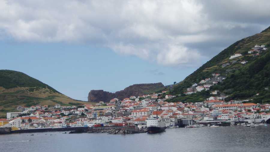 Over view of Velas near sea with cloudy sky in S. Jorge Island, Azores.