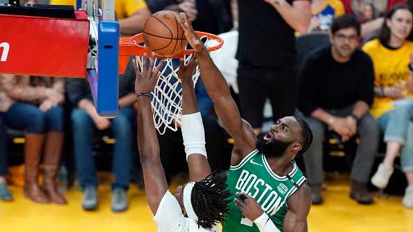 SAN FRANCISCO, CALIFORNIA - JUNE 02: Jaylen Brown #7 of the Boston Celtics blocks the shot attempt by Kevon Looney #5 of the Golden State Warriors during the first quarter in Game One of the 2022 NBA Finals at Chase Center on June 02, 2022 in San Francisco, California. NOTE TO USER: User expressly acknowledges and agrees that, by downloading and/or using this photograph, User is consenting to the terms and conditions of the Getty Images License Agreement. (Photo by Thearon W. Henderson/Getty Images)
