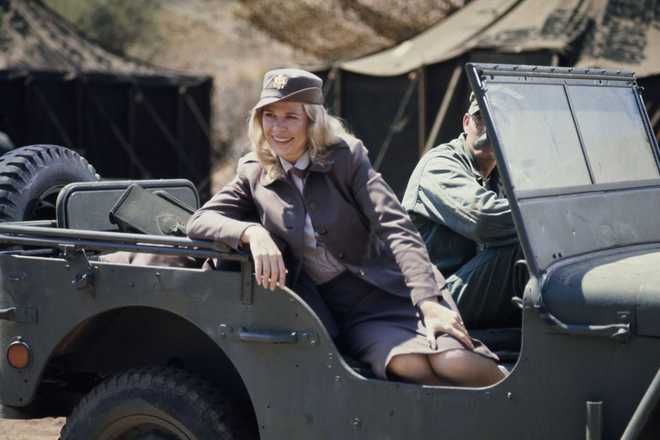 Loretta Swit sitting in a jeep during the filming of television show M*A*S*H, United States, August 1976. She plays the character Maj. Margaret &quot;Hot Lips&quot; Houlihan. (Photo by Michael Ochs Archives/Getty Images)
