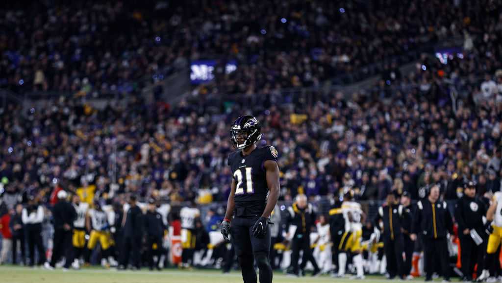 Baltimore Ravens cornerback Brandon Stephens (21) stands on the field  before the start of an NFL