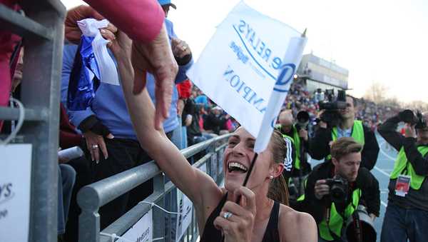 DES MOINES, IA- APRIL 26:  Jenny Simpson of New Balance celebrates with a family member after winning the Women's 1500 Meter London Games Rematch at the Drake Relays, on April 26, 2013 at Drake Stadium, in Des Moines, Iowa. (Photo by Matthew Holst/Getty Images)