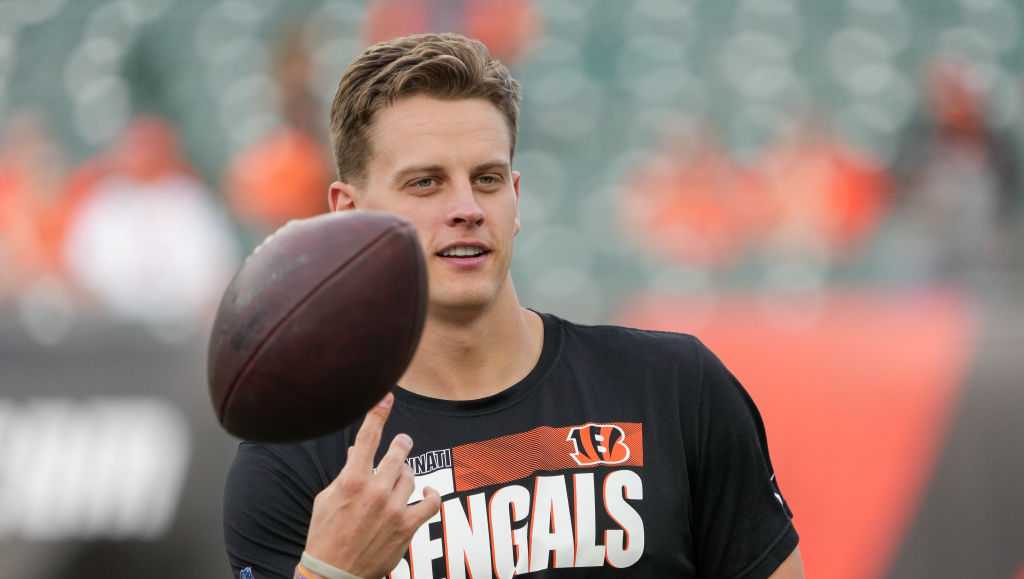 Joe Burrow of the Cincinnati Bengals runs with the ball against the News  Photo - Getty Images