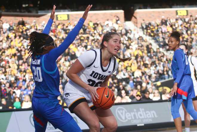 IOWA&#x20;CITY,&#x20;IOWA-&#x20;OCTOBER&#x20;15&#x3A;&#x20;&#x20;Guard&#x20;Kate&#x20;Martin&#x20;&#x23;20&#x20;of&#x20;the&#x20;Iowa&#x20;Hawkeyes&#x20;goes&#x20;to&#x20;the&#x20;basket&#x20;during&#x20;the&#x20;second&#x20;half&#x20;against&#x20;guard&#x20;Shakara&#x20;McCline&#x20;&#x23;20&#x20;of&#x20;the&#x20;DePaul&#x20;Blue&#x20;Demons&#x20;at&#x20;Kinnick&#x20;Stadium&#x20;during&#x20;the&#x20;Crossover&#x20;at&#x20;Kinnick&#x20;event&#x20;on&#x20;October&#x20;15,&#x20;2023&#x20;in&#x20;Iowa&#x20;City,&#x20;Iowa.&#x20;&#x20;&#x28;Photo&#x20;by&#x20;Matthew&#x20;Holst&#x2F;Getty&#x20;Images&#x29;