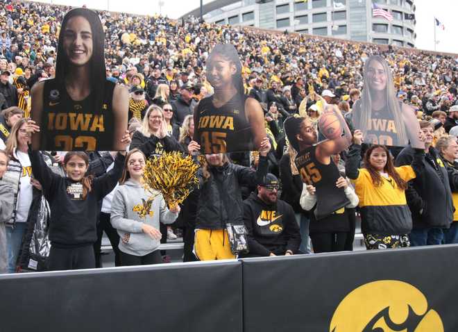 IOWA&#x20;CITY,&#x20;IOWA-&#x20;OCTOBER&#x20;15&#x3A;&#x20;&#x20;Fans&#x20;cheer&#x20;while&#x20;attending&#x20;the&#x20;Crossover&#x20;at&#x20;Kinnick&#x20;Event&#x20;to&#x20;watch&#x20;the&#x20;exhibition&#x20;match-up&#x20;between&#x20;the&#x20;Iowa&#x20;Hawkeyes&#x20;and&#x20;the&#x20;DePaul&#x20;Blue&#x20;Demons&#x20;at&#x20;Kinnick&#x20;Stadium&#x20;on&#x20;October&#x20;15,&#x20;2023&#x20;in&#x20;Iowa&#x20;City,&#x20;Iowa.&#x20;&#x20;&#x28;Photo&#x20;by&#x20;Matthew&#x20;Holst&#x2F;Getty&#x20;Images&#x29;