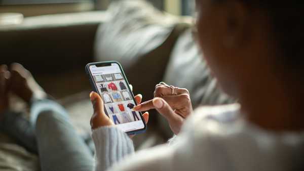Woman purchasing clothes on a mobile app