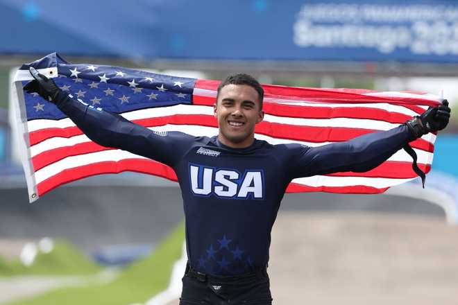 SANTIAGO, CHILE - OCTOBER 22: Gold medalist Kamren Larsen of Team United States celebrates after winning in Men&amp;apos;s BMX Racing at Parque Peñalolen on Day 2 of Santiago 2023 Pan Am Games on October 22, 2023 in Santiago, Chile. (Photo by Al Bello/Getty Images)