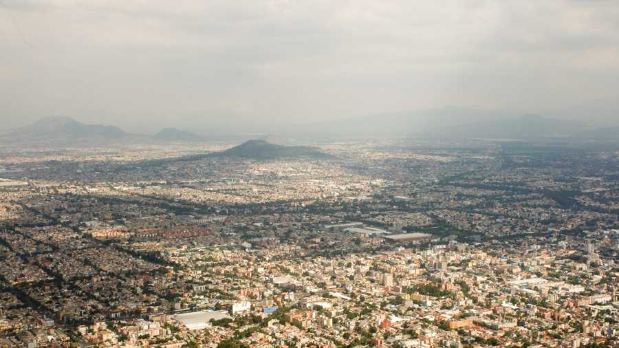 Overview of the southeastern portion of Mexico City and bordering portions of Mexico State, taken from an aircraft on final approach to Mexico City International Airport (MEX).