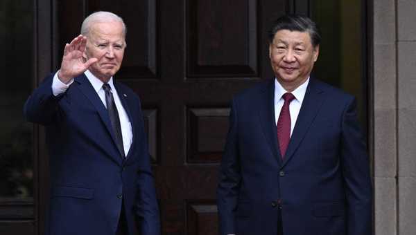 US President Joe Biden greets Chinese President Xi Jinping before a meeting during the Asia-Pacific Economic Cooperation (APEC) Leaders' week in Woodside, California on November 15, 2023.