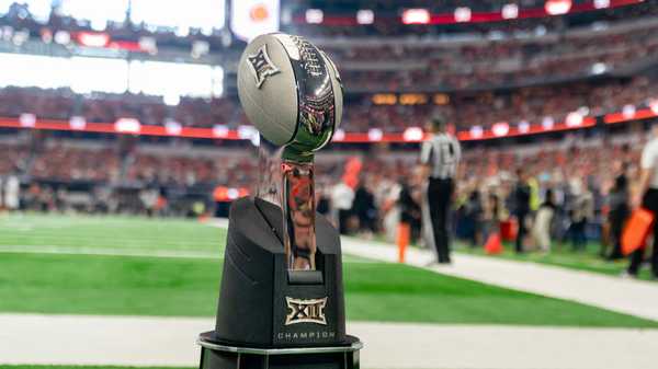 ARLINGTON, TX - DECEMBER 02: The Big 12 Championship trophy and WWE Championship belt sit on the sidelines during the Big 12 Championship game between the Texas Longhorns and the Oklahoma State Cowboys   on December 02, 2023 at AT&T Stadium in Arlington, TX. (Photo by Chris Leduc/Icon Sportswire via Getty Images)
