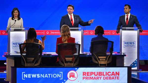 Florida Governor Ron DeSantis (C) gestures as he speaks, flanked by former Governor from South Carolina and UN ambassador Nikki Haley (L) and entrepreneur Vivek Ramaswamy, during the fourth Republican presidential primary debate at the University of Alabama in Tuscaloosa, Alabama, on December 6, 2023.