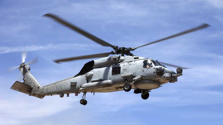 A U.S. Navy SH-60 Seahawk helicopter in flight; a similar helicopter crashed off the coast of San Diego on Tuesday.
