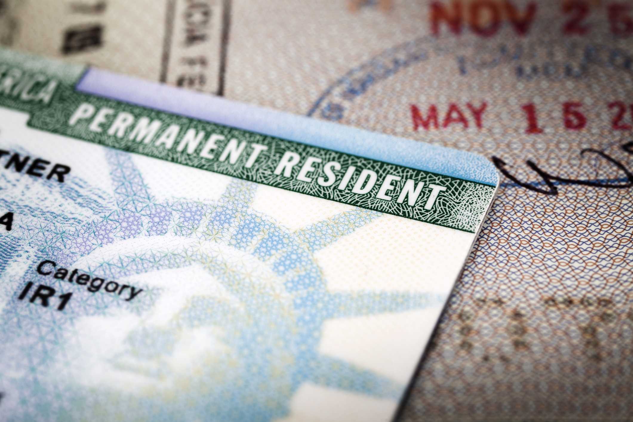 New York and 21 other states sue to block DHS rule that would make it harder for some immigrants to get green cards; rule takes effect Friday