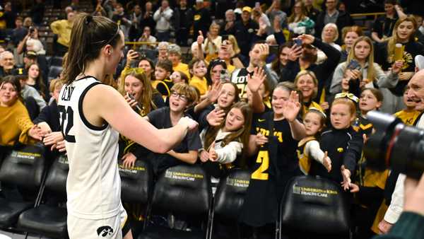 IOWA CITY, IA - DECEMBER 30: Iowa guard Caitlin Clark (22) greets the sellout crowd after winning a women's college basketball game between the Minnesota Golden Gophers and the Iowa Hawkeyes on December 30, 2023, at Enterprise Center in St. Louis, MO. (Photo by Keith Gillett/Icon Sportswire via Getty Images)